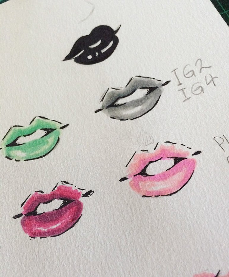Colorful lips in sketchbook