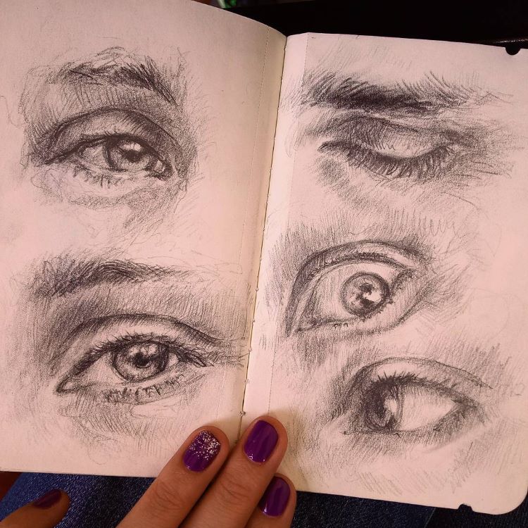 Detailed sketchbook eye drawings