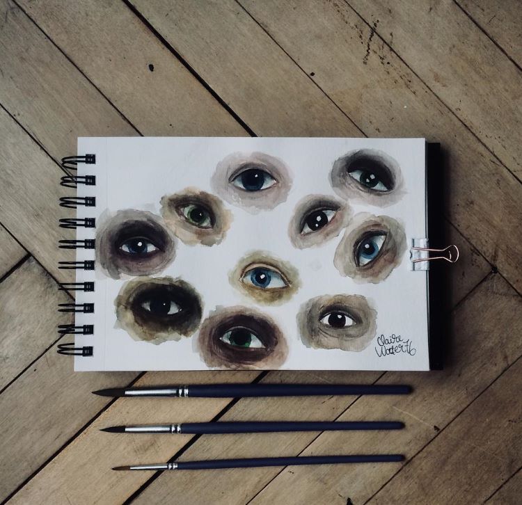 Various watercolor eyes in different shades