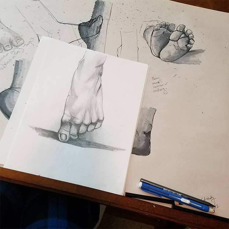 Detailed foot drawn in realist style