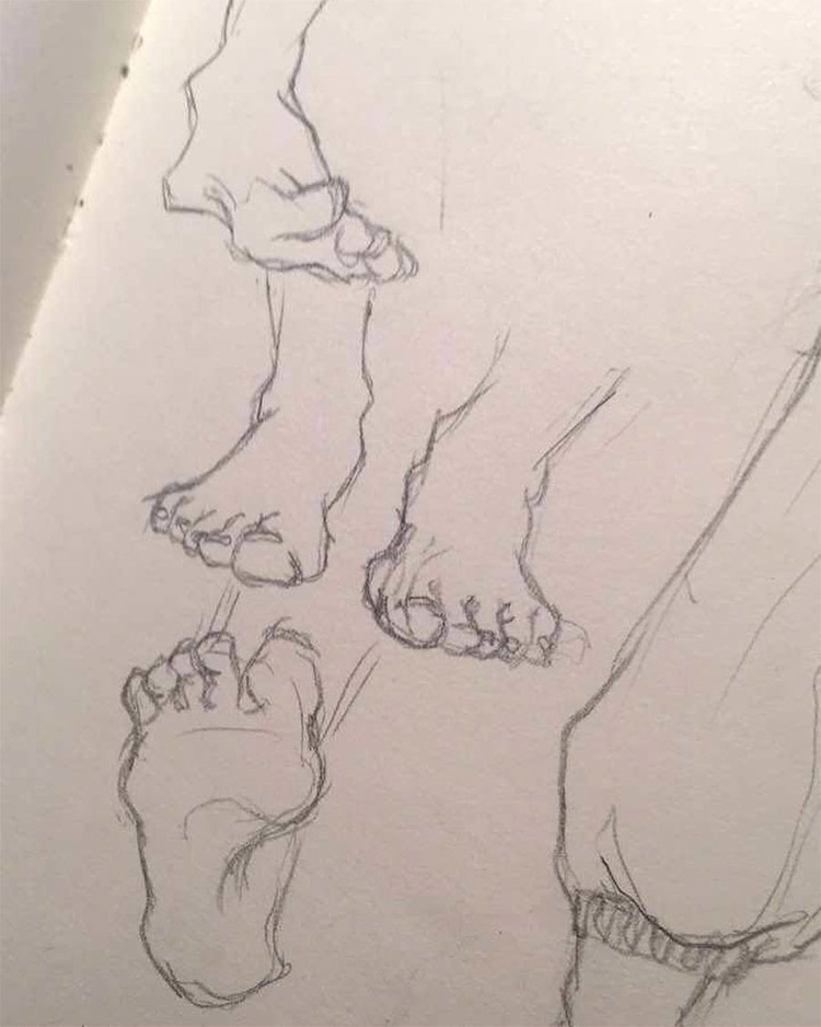 Various drawings of feet in sketchbook